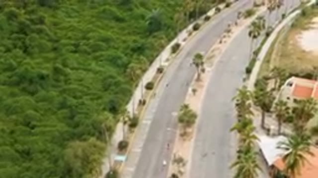 SAN JOSE DEL CABO BCS MEXICO-2023: Aerial Road With A Few Cars Driving Down It