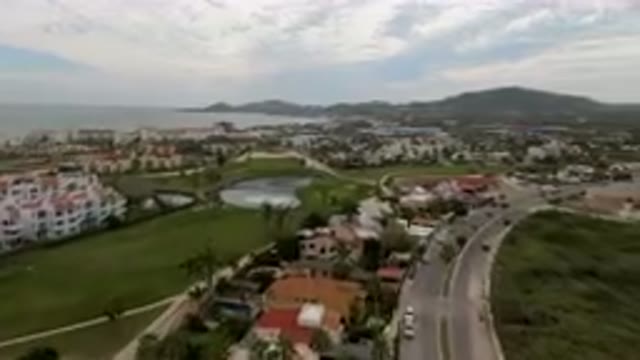 SAN JOSE DEL CABO BCS MEXICO-2023: Aerial Town With A Golf Course And A River