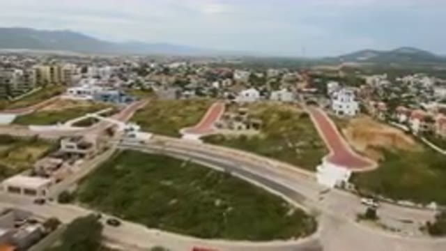 SAN JOSE DEL CABO BCS MEXICO-2023: Aerial City With A Highway And A Bridge