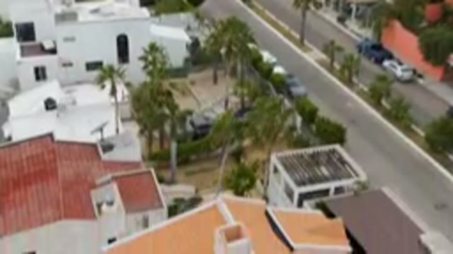 SAN JOSE DEL CABO BCS MEXICO-2023: Street With A Few Cars Parked On It