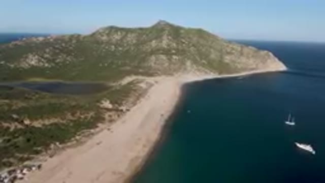 LOS FRAILES BCS MEXICO-2023: Boat Sailing Near Beach Between Two Valleys