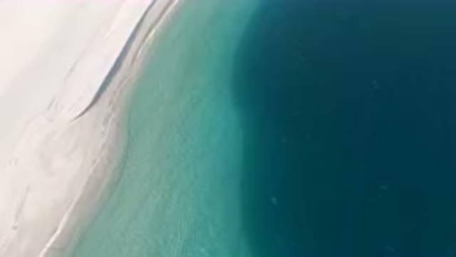 LOS FRAILES BCS MEXICO-2023: Flying Over A Beach With A Body Of Water