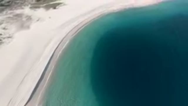 LOS FRAILES BCS MEXICO-2023: Flying Over A Beach With A Blue Body Of Water