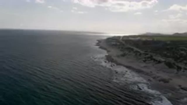 SHIPWRECKS BEACH LOS CABOS BCS MEXICO-2023: Arafly Beach With A Cliff And A Body