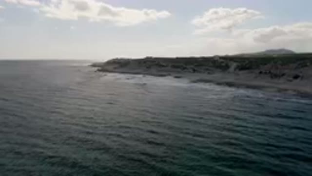 SHIPWRECKS BEACH LOS CABOS BCS MEXICO-2023: Beach and a Cliff from a Boat