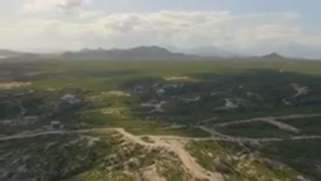 SHIPWRECKS BEACH LOS CABOS BCS MEXICO-2023: Aerial Small Town On A Hill With A