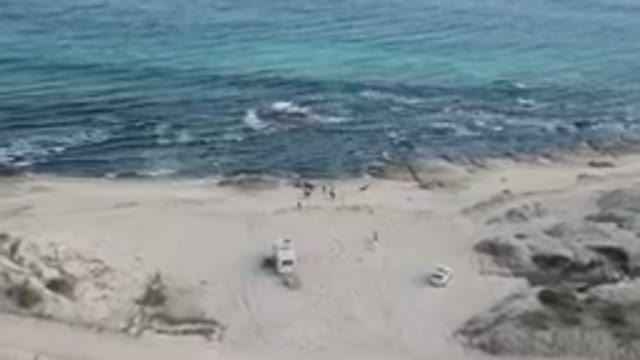 SHIPWRECKS BEACH LOS CABOS BCS MEXICO-2023: Two Vehicles Parked On The Beach
