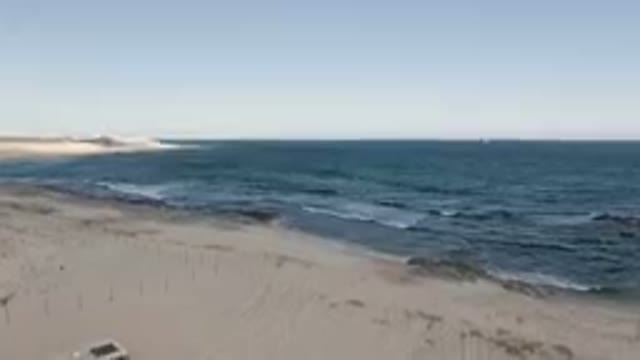 SHIPWRECKS BEACH LOS CABOS BCS MEXICO-2023: Beach With A Boat In The Distance