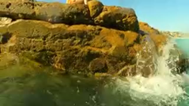 PALMILLA BCS MEXICO-2023: Woman Sitting On A Rock In The Water