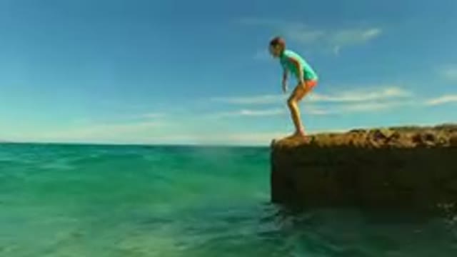 PALMILLA BCS MEXICO-2023: Girl Standing On A Rock In The Ocean