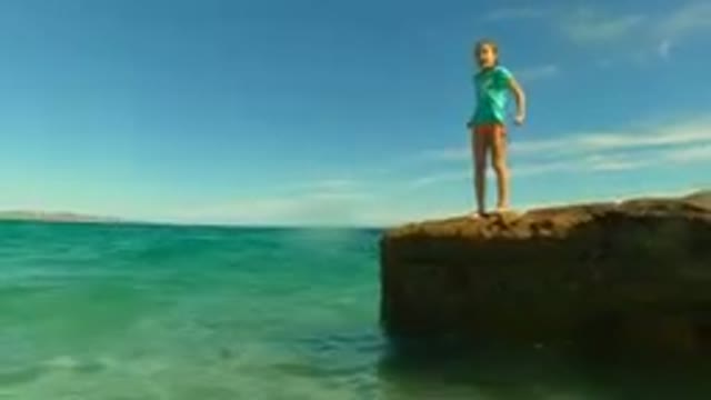 PALMILLA BCS MEXICO-2023: Girl Atop A Rock in the Ocean