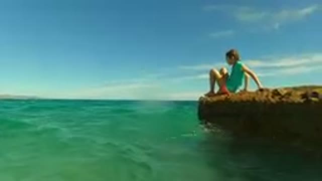 PALMILLA BCS MEXICO-2023: Girl Watching Fish from a Rock