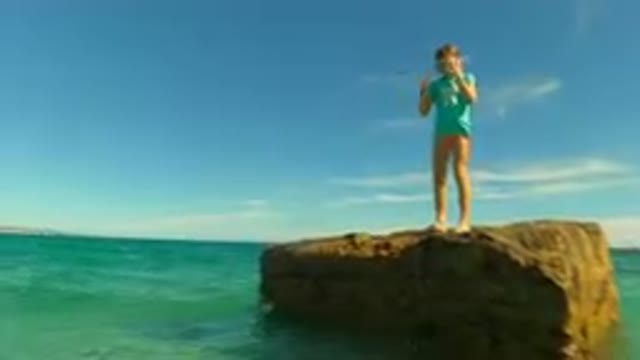PALMILLA BCS MEXICO-2023: Girl Preparing to Jump into the Ocean