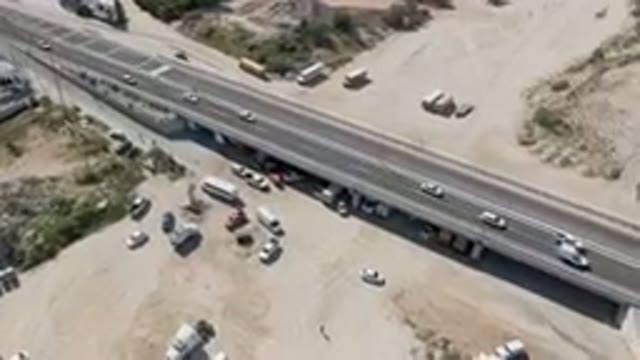 COSTA AZUL LOS CABOS BCS MEXICO-2023: Highway With A Bridge And Cars On It In