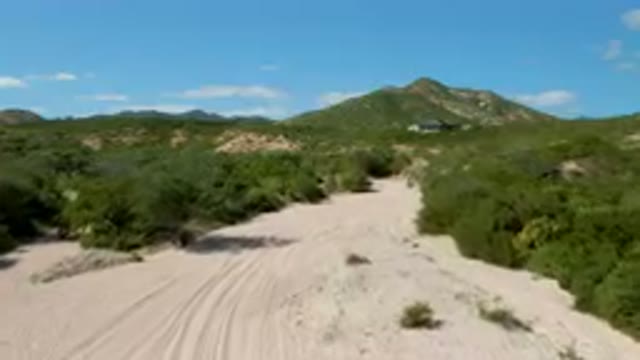 CABO PULMO BCS MEXICO-2023: Dirt Road With A Dirt Path Leading To A House In The