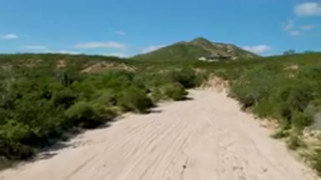 CABO PULMO BCS MEXICO-2023: Dirt Road With A Hill In The Background
