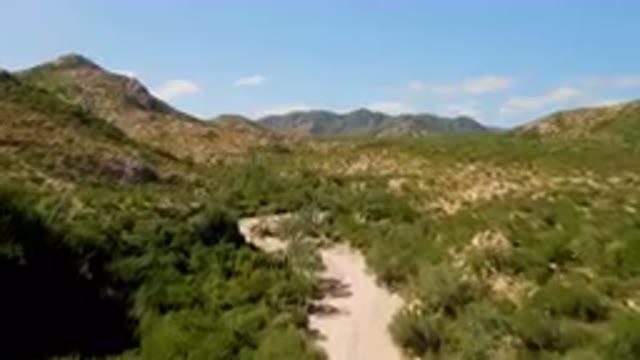CABO PULMO BCS MEXICO-2023: Dirt Road Winding Through A Valley