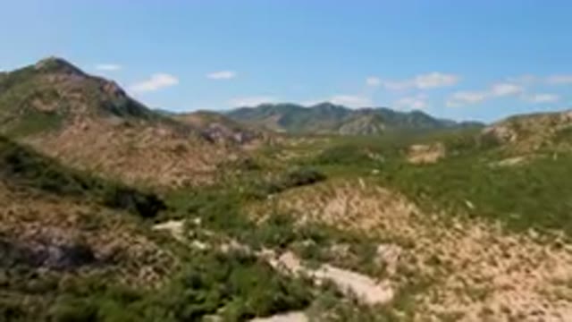 CABO PULMO BCS MEXICO-2023: Mountains With A Dirt Road In The Middle Of Them