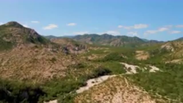CABO PULMO BCS MEXICO-2023: Mountains With A River Running Through Them And A