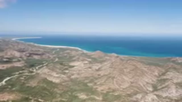 CABO PULMO BCS MEXICO-2023: Mountain Range With A Body Of Water