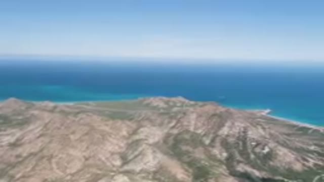 CABO PULMO BCS MEXICO-2023: Mountain With A Blue Ocean In The Background