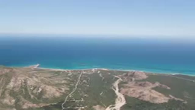CABO PULMO BCS MEXICO-2023: Aerial View of Beach and Body of Water from a Plane