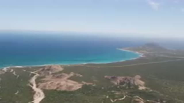 CABO PULMO BCS MEXICO-2023: Aerial View of Beach and Body of Water from a Plane