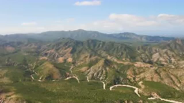 CABO PULMO BCS MEXICO-2023: Winding Road In The Mountains With A Blue Sky