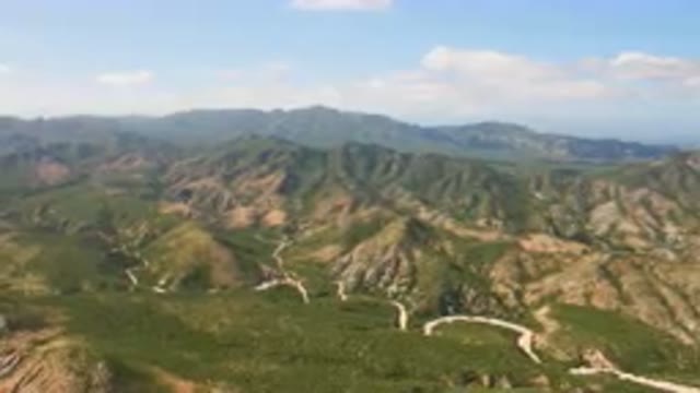 CABO PULMO BCS MEXICO-2023: Winding Road In The Mountains With A Blue Sky