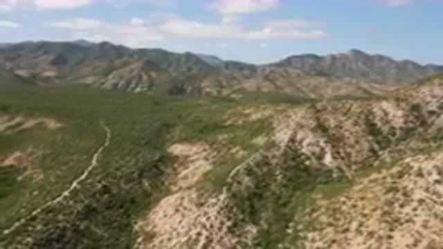 CABO PULMO BCS MEXICO-2023: Mountains With A Winding Trail In The Middle Of Them