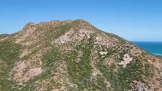 CABO PULMO BCS MEXICO-2023: Mountain With A Blue Ocean And A Clear Sky