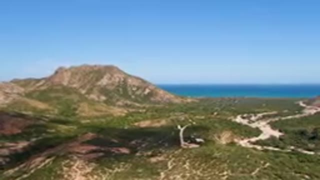 CABO PULMO BCS MEXICO-2023: Winding Road In A Mountainous Area With A Blue Ocean