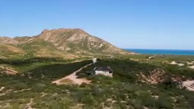 CABO PULMO BCS MEXICO-2023: House With A Roof And A Car Parked In Front Of It