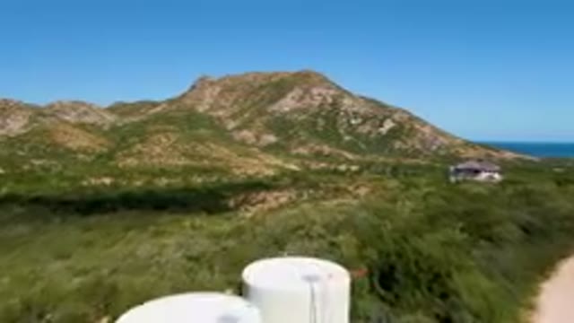 CABO PULMO BCS MEXICO-2023: Large White Tank Sitting In The Middle Of A Field
