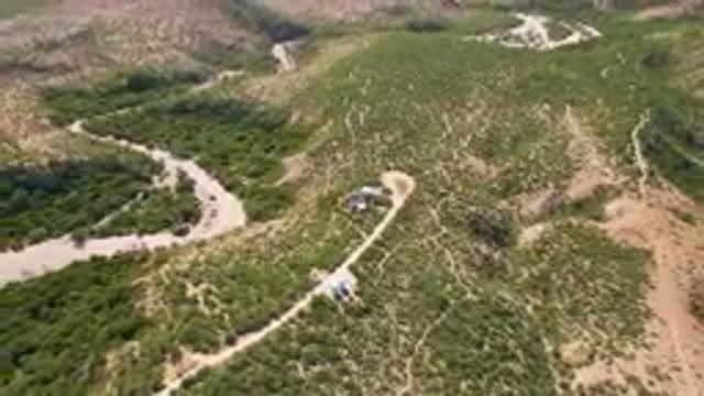 CABO PULMO BCS MEXICO-2023: Aerial Road Winding Through A Valley With A House In