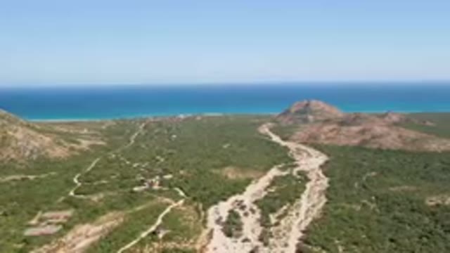 CABO PULMO BCS MEXICO-2023: Aerial Winding Road In A Mountainous Area With A
