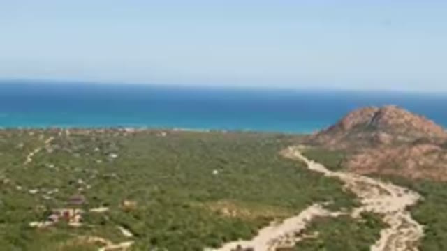 CABO PULMO BCS MEXICO-2023: Aerial Scenic Area With A Winding Road And A Beach