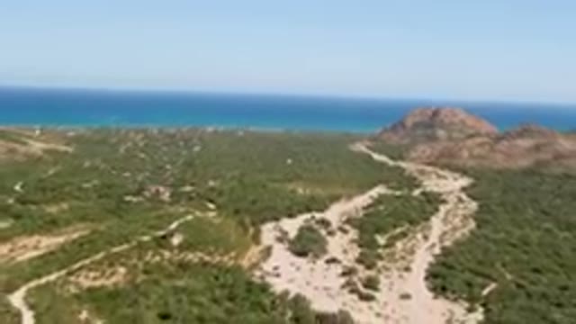 CABO PULMO BCS MEXICO-2023: Aerial Winding Road In A Mountainous Area With A