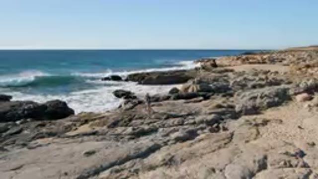 LAGUNA BEACH LOS CABOS BCS MEXICO-2023: Family Walking Coastal Rocks
