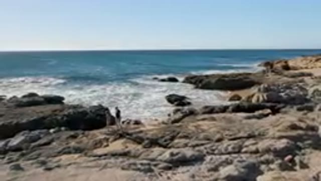 LAGUNA BEACH LOS CABOS BCS MEXICO-2023: Family Walking Rocky Coast