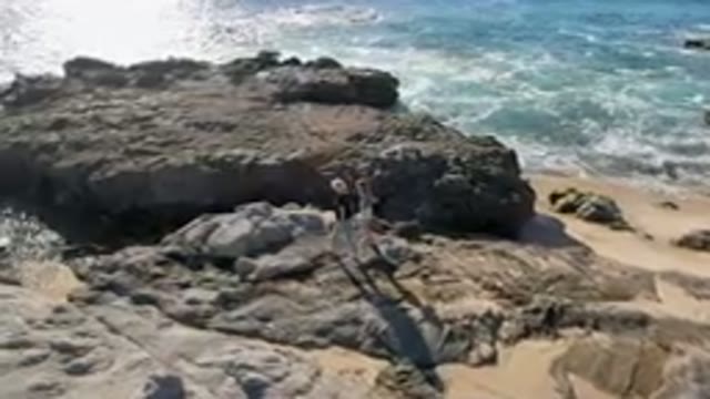 LAGUNA BEACH LOS CABOS BCS MEXICO-2023: Family Exploring Rocky Coast