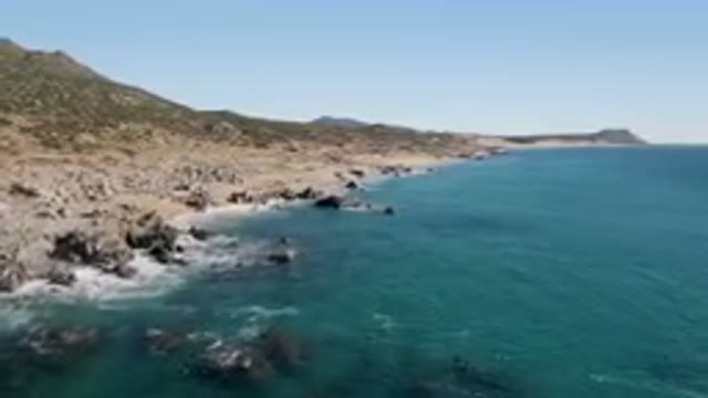 LAGUNA BEACH LOS CABOS BCS MEXICO-2023: Rocky Beach With A Body Of Water