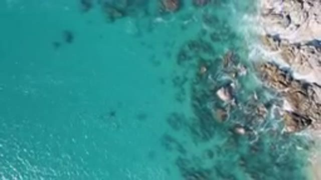LAGUNA BEACH LOS CABOS BCS MEXICO-2023: Aerial Beach With A Boat And A Person On