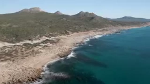 LAGUNA BEACH LOS CABOS BCS MEXICO-2023: Beach With A Mountain In The Background