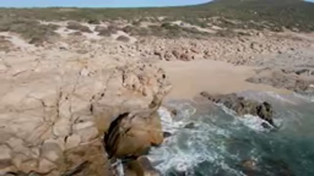 LAGUNA BEACH LOS CABOS BCS MEXICO-2023: People Walking Along The Beach Near The