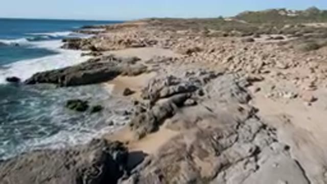 LAGUNA BEACH LOS CABOS BCS MEXICO-2023: Rocky Beach With Waves Crashing On The Shore