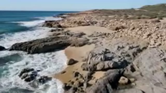 LAGUNA BEACH LOS CABOS BCS MEXICO-2023: Rocky Beach With Waves Crashing On The Shore