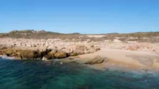 LAGUNA BEACH LOS CABOS BCS MEXICO-2023: Large Body Of Water Near A Rocky Shore