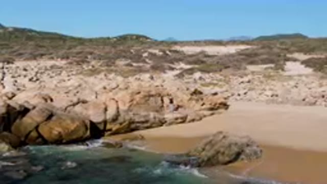 LAGUNA BEACH LOS CABOS BCS MEXICO-2023: Large Rock Formation On The Beach Near