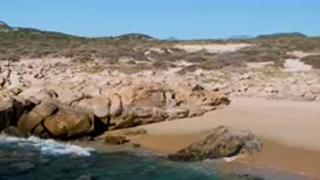 LAGUNA BEACH LOS CABOS BCS MEXICO-2023: Rocky Beach With a Few People Walking On